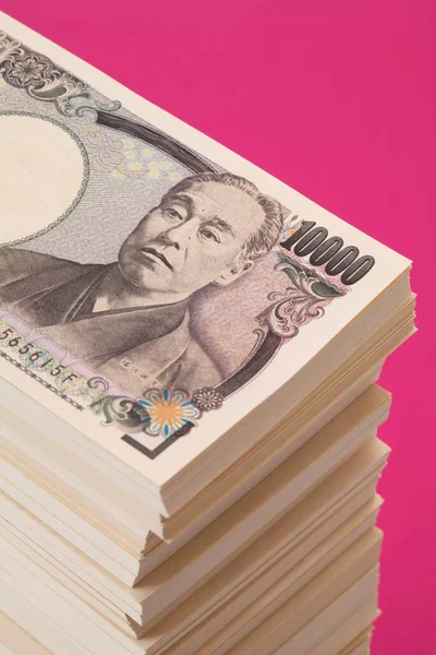 Japanese currency,  yen banknotes and coins, financial background