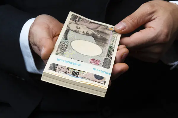Ruce Japonských Jenů Peníze Pozadí Zblizka — Stock fotografie