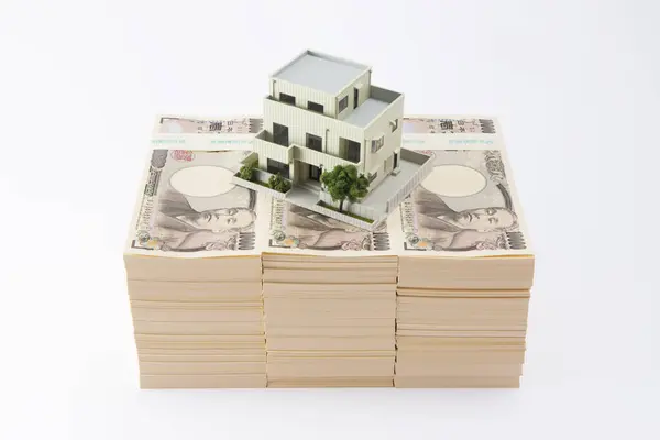 Uang Kertas Yen Jepang Dan Model Rumah Pada Latar Belakang — Stok Foto