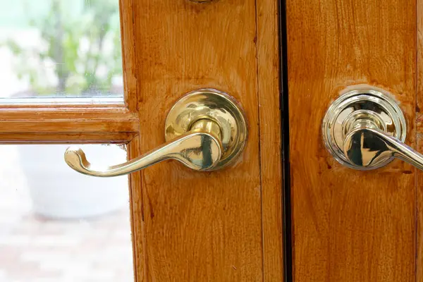 old handles on wooden door