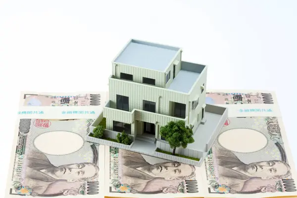 Japońska Waluta Stos Banknotów Jenowych Model Domu — Zdjęcie stockowe