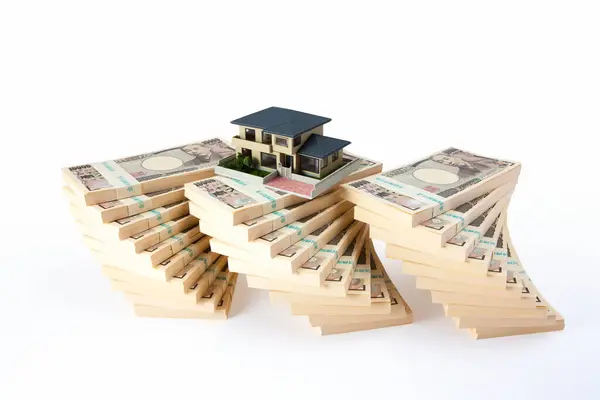 日元现钞和房屋模型 — 图库照片