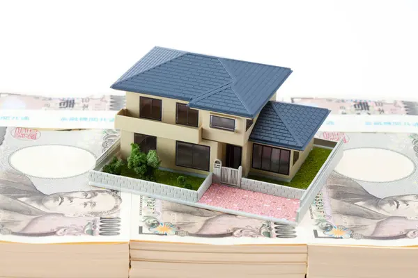 Japońska Waluta Stos Banknotów Jenowych Model Domu — Zdjęcie stockowe