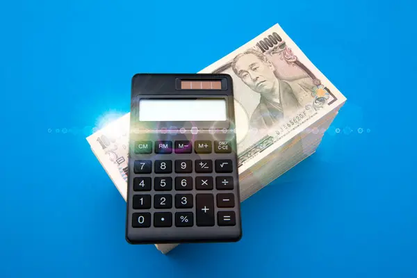 Calculadora Com Dinheiro Iene Japonês Fundo Conceito Negócio — Fotografia de Stock