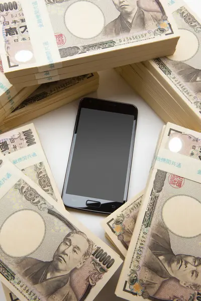 Smartphone Dengan Uang Jepang Yen Latar Belakang Tampilan Atas — Stok Foto