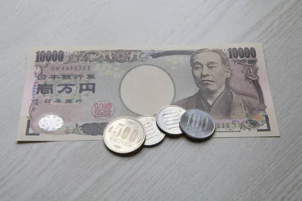 Monety Jenów Japońskich Banknot Jenowy Tle — Zdjęcie stockowe