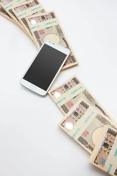 Smartphone Com Dinheiro Iene Japonês Fundo Branco Vista Superior — Fotografia de Stock