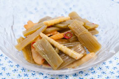 traditional Japanese food Tsukemono, preserved vegetables, usually pickled in salt, brine or a bed of rice bran clipart
