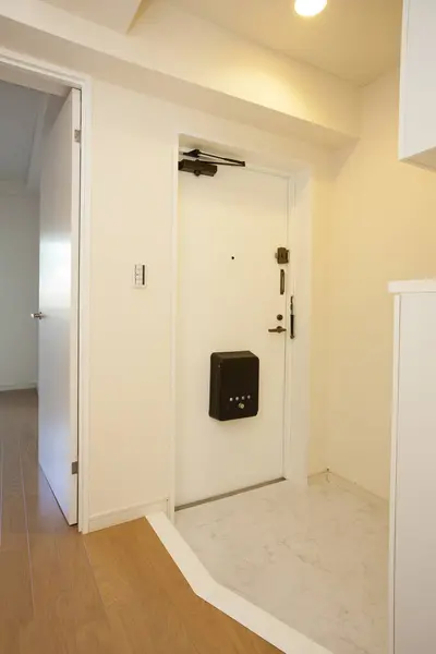 empty white room with door and door.