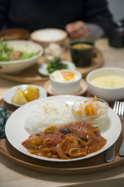 Closeup of Japanese Food on Restaurant Table 