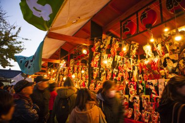 Hagoita Ichi Winter Festival at Sensoji Temple in Asakusa, Japan. Asakusa's annual year-end Hagoita Fair is a colorful and exciting traditional event. clipart