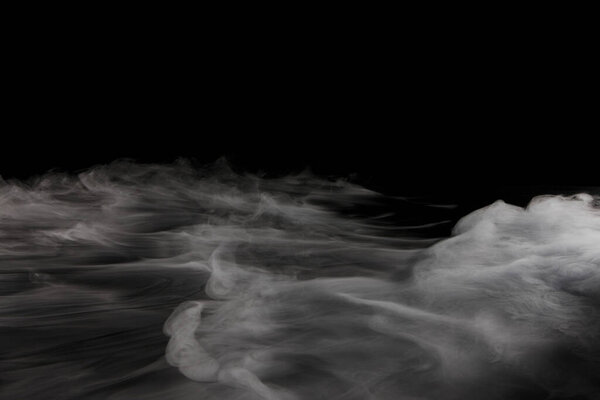 abstract background of black and white smoke. white smoke on dark background                