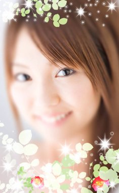 Çiçek çerçeveli güzel Asyalı bir kadının yakın plan portresi. 