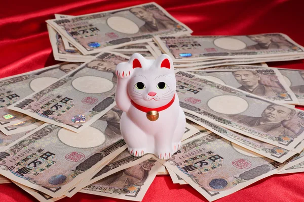 Japońskie Banknoty Jenowe Kot Maneki Neko Symbolizujące Szczęście Bogactwo — Zdjęcie stockowe