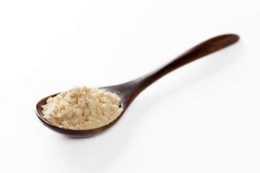 kaşık yakın görüntüsünde kahverengi toz