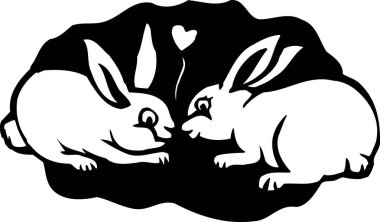 Beyaz arka planda izole edilmiş siyah beyaz iki tavşan.