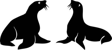 Beyaz arka planda izole edilmiş iki mühür resmi.