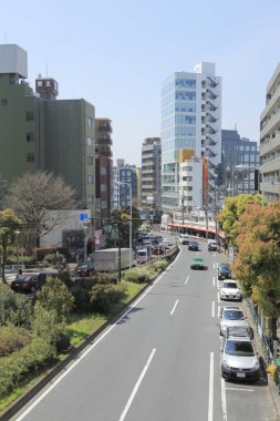 Tokyo 'nun işlek caddesi, Japonya, gündüz manzaralı. 