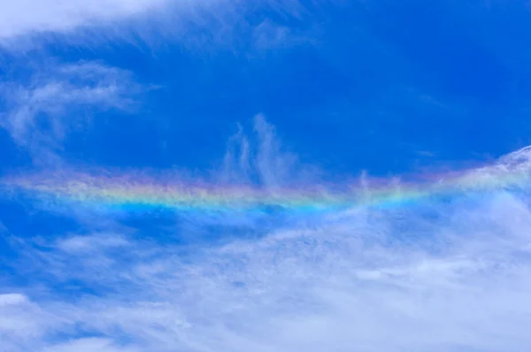 rainbow and sky with clouds on nature background