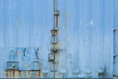 Mavi endüstriyel metal dokusu. Eski boyalı çelik duvar.