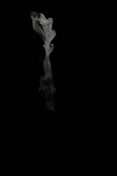 White smoke in black background