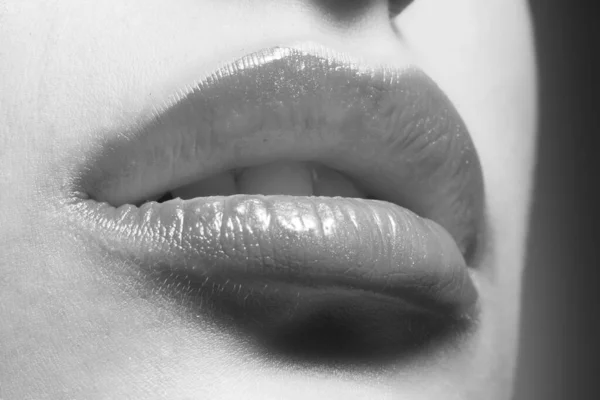 female lips and lip gloss, macro photo
