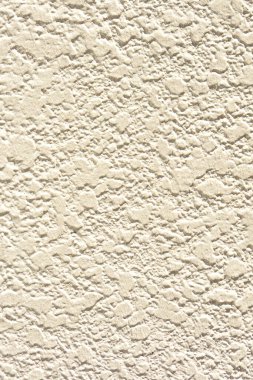 Bej duvar dokusunun soyut arkaplanı