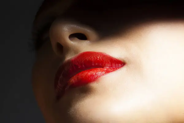 woman face with red lips. beautiful girl with red lips. beauty and fashion model concept.