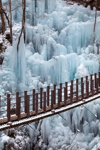 frozen waterfall in winter time