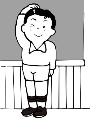 Sınıfta tahtanın yanında duran bir çocuk. 