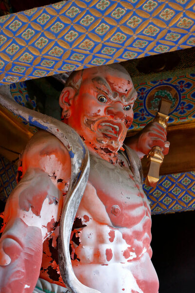 close-up shot of traditional ancient decor in wooden japanese temple