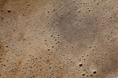 Arka planda köpüklü kahve, kapat.