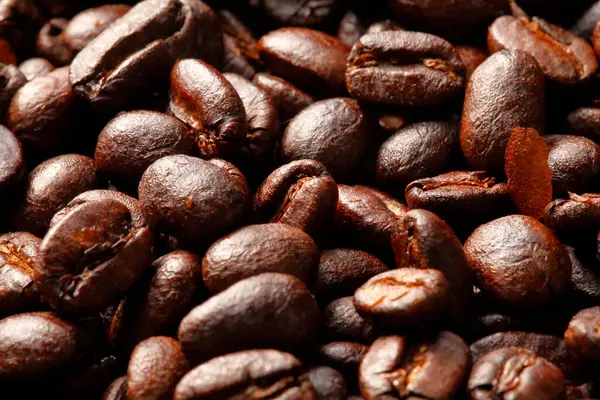 Coffee Beans Close Background Royalty Free Stock Photos