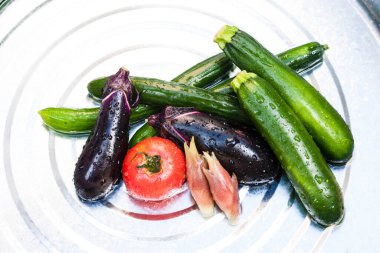 fresh vegetables in the plate.