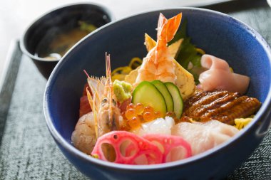 Colorful bowl of assorted sushi