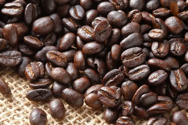 Kahve Çekirdekleri Arka Plan Üzerinde Yakın Çekim — Stok fotoğraf