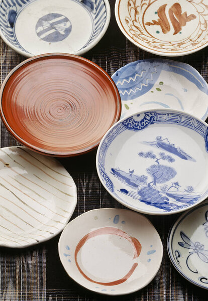 Variety of decorative ceramic plates displayed
