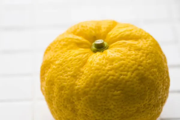 yellow fresh lemon on white background