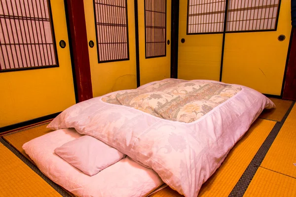 japanese bedroom interior with double bed