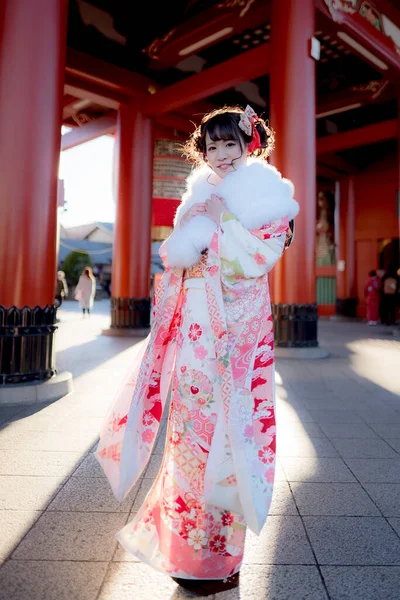 stock image Beautiful Japanese woman wearing traditional dress. Stylish female portrait at Japanese city