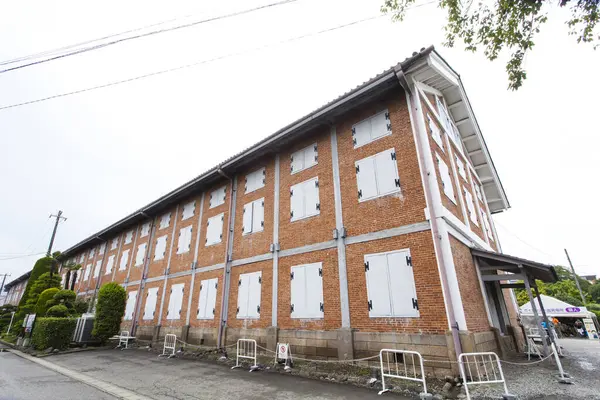 Stock image shuttered windows of old Tomioka Silk Mill in Gunma, Japan. UNESCO World Heritage site