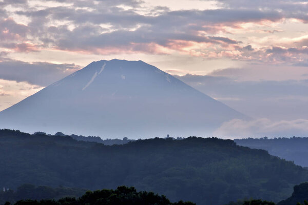 Mountain fuji and sunrise with clouds in the sky in Japan