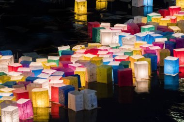 Obon Festival, colorful lanterns floating on Lake Shinji, Matsue, Japan clipart