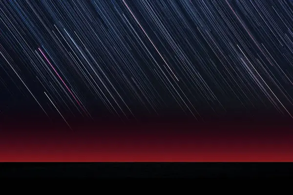 red sky with stars in the night sky. abstract texture