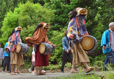 Japanese festival with dancing people wearing bright costumes. Nanbu Ryotsuji Lion Dance. Saitama City Agricultural Festival in Japan clipart