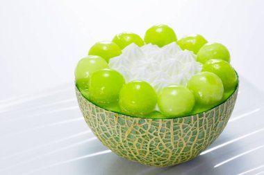 coconut fruit in white bowl