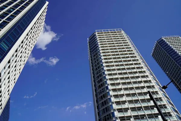 stock image modern city architecture, Tokyo, Japan. Skyscrapers against blue sky on a sunny day 