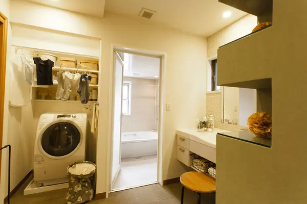 a washer and dryer in a small room
