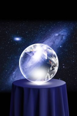 kristal küre yıldızlı karanlık arkaplana karşı.