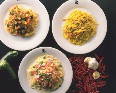 Showcasing three delicious pasta dishes